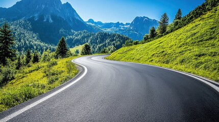 Winding asphalt road in the Austrian Alps surrounded by lush greenery and towering mountains under a clear blue sky