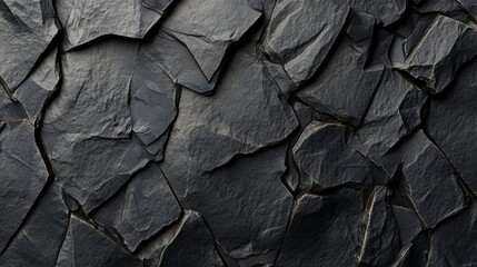 Black stone texture with rough surface and subtle gradients