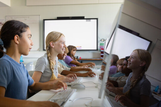 School children learning coding in computer science class