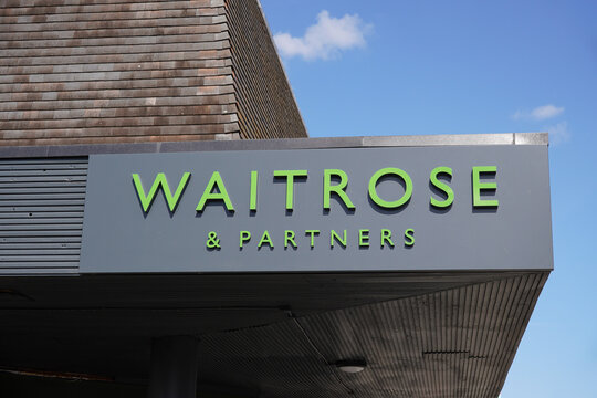 Southampton England 16 September 2024 - Waitrose grocery store sign and logo. Waitrose & Partners 