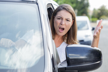 woman driver arguing and driving car