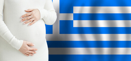 Pregnant woman belly against Greek flag background. Demographics and pregnancy in Greece concept