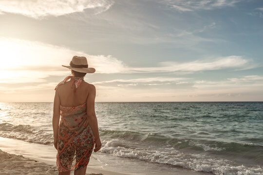 Woman enjoys tranquil beach in Varadero, Cuba