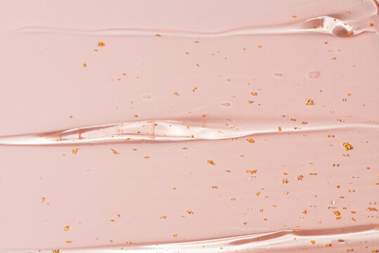 Luxurious 24k gold cream gel texture and smears