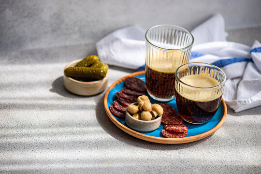 Traditional Kvass and Eastern European Snacks on a Table