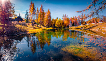 Astonishing autumn view of Scin lake. Wonderful morning scene of outskirts of Cortina d'Ampezzo town,  Province of Belluno, Italy, Europe. Colorful landscape of Dolomite Alps. Travel the world..