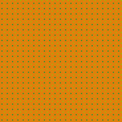 Small green polka dots on yellow orange tangerine color background Autumn abstract geometric seamless pattern Simple rustical style