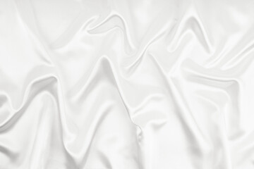 Obraz premium Abstract white fabric texture background. Cloth soft wave. Creases of satin, silk.