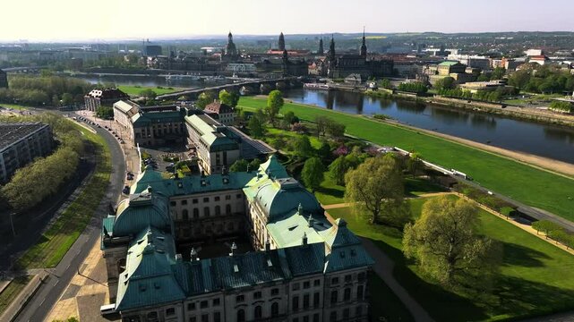 Dresden, Germany. Aerial View of Historic Buildings and Cathedral by Elbe River and Augustus Bridge, Revealing Drone Shot