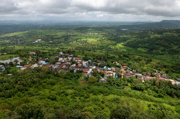Kolhapur , India - 8 September 2024 Top angle view developed village modern village from  Panhala fort at Kolhapur Maharashtra India © ArunK