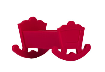 Red colored toy crib. Transparent PNG. Concept of everyday elements and furniture
