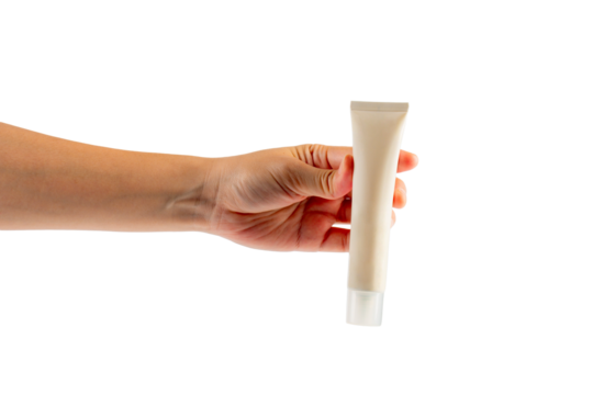 Plastic white tube for cream or lotion. Skin care or sunscreen cosmetic with hand on transparent background. - Powered by Adobe