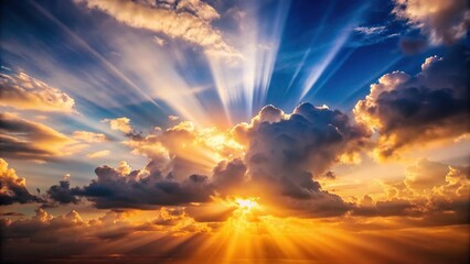Beautiful sunset with rays of sunlight through clouds