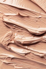 The close-up of a smooth, dabbed-on makeup foundation that blends seamlessly into the skin, providing a natural and flawless look.