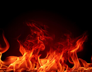 Fototapeta premium Red hot fire flames on black background; copy space, banner; soft focus