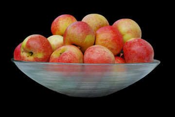 Apple, diet and bowl on black background for nutrition, eating and healthy food with sustainability. Fruit, container and harvest in studio for vitamin C, hydration and eco friendly agriculture