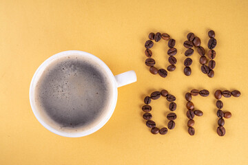 Simple white espresso coffee cup with On and Off lettering