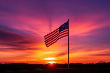 An American flag flying high against a breathtaking sunset backdrop