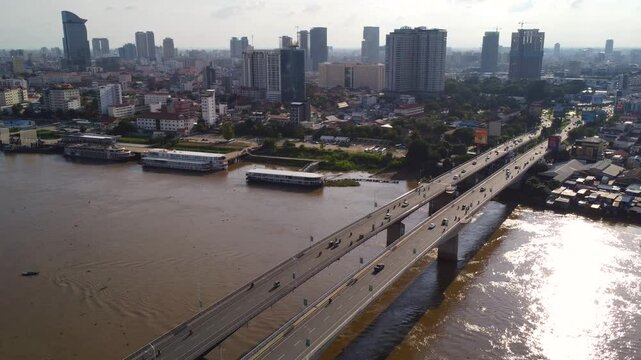 Phnom Penh Cambodia Bridge highway motorway road infrastructure, aerial city skyline