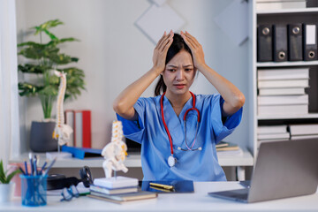 Headache stress, nurse or doctor asian woman in hospital feeling pain, tired or sick. Healthcare,...