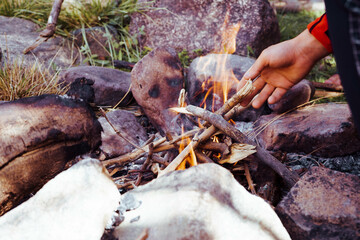 A Small Fire in the Amsouzart Forest, Morocco: Nature's Warmth