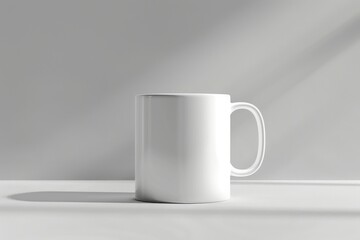 Plain white mug placed on a minimalist countertop with soft natural lighting creating subtle shadows in the afternoon. Mockup
