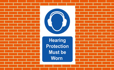 Obraz premium Hearing protection must be worn sign on the wall