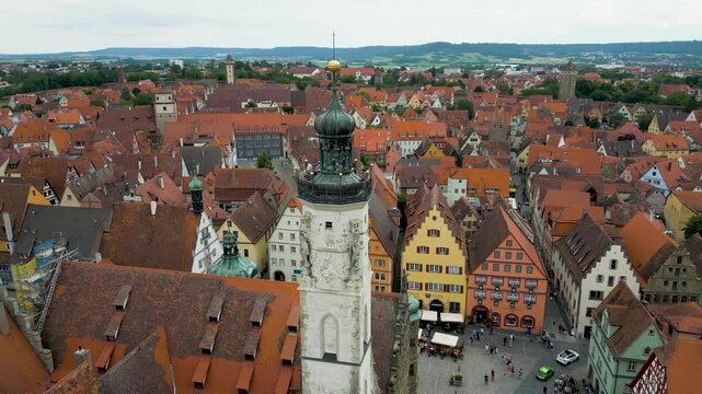 4K Aerial Drone Video of the Historic Town Hall Tower on the Market Square of the Walled City of Rothenburg ob der Tauber, Germany