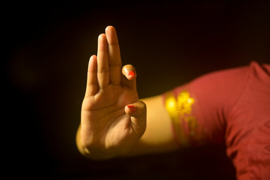 Hand gesture called Arala in Bharatnatyam, Indian Classical Dance Form, India.