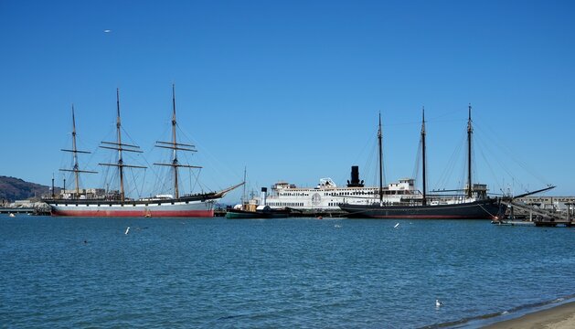  1886 Square-Rigger Balclutha, Eureka Steamboat, C.A. Thayer Lumber Schooner and Eppleton Hall Paddlewheel Tugboat moored at Hyde St Pier.. San Francisco, California, USA. September 2024. 