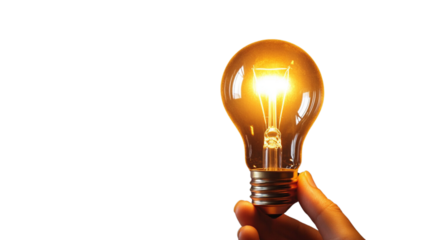 A hand holding a light bulb