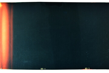 Grungy color 120mm negative film isolated on white background. Medium format film material on white background, retro photo placeholder.
