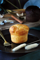 Close up Fresh Butter Muffin serve on Black Plate