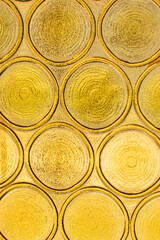 Golden circular patterns resembling tree rings, symbolizing nature and growth, ideal for environmental and sustainability-related projects