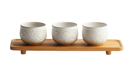 Three white and black cups on a wooden tray