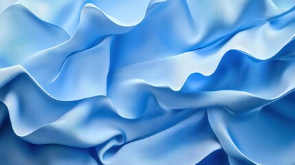 Fototapeta premium Abstract blue fabric texture with soft waves and folds, creating a smooth and elegant background.
