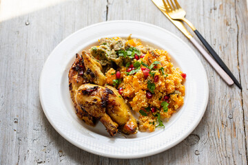 Roast chicken, couscous with butternut squash pomegranate and eggplant dip