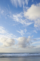 Beach, shoreline or tourism with clouds, sky or paradise for vacation or environment to relax. Brazil, outdoor nature or scenic view of island, sea and ocean in Rio de Janeiro for travel destination