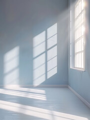 Fototapeta premium A serene and bright room with soft blue walls, sunlight streaming through large windows, creating beautiful shadows on floor. atmosphere feels calm and inviting