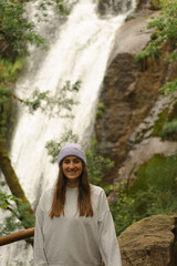 Happy Hiker at Ribasieira Falls on a Cloudy Day