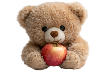 a teddy bear holding an apple