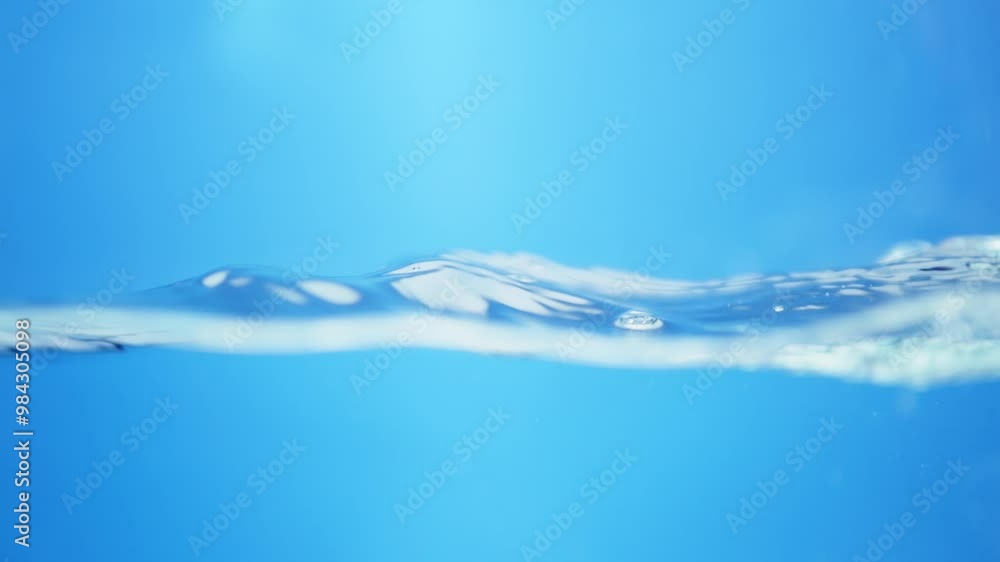 Poster fluid motion in nature. macro view of blue water waves creating smooth ripples.