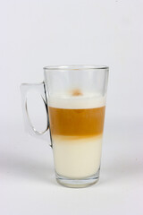 cappuccino in a transparent mug isolated on white 
