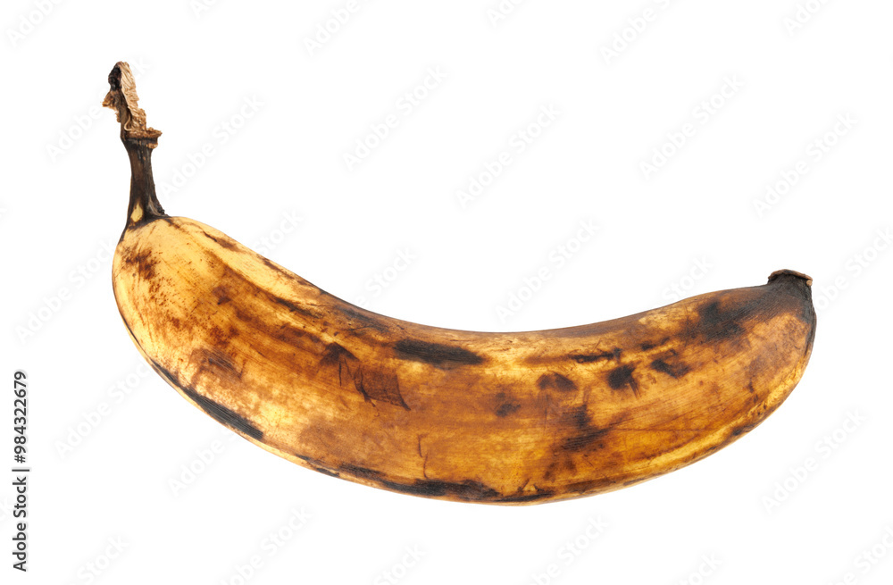 Wall mural darkened overripe bananas isolated on a white background. blackened banana peel. spoiled banana.