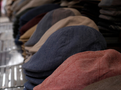 Sicilian Coppola hats on sale at the Siracusa Market Sicily, Italy.