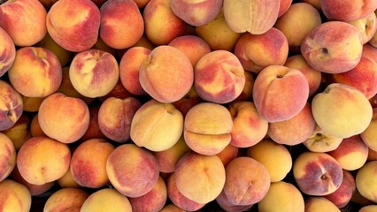 peaches on the market. close up of peaches seen from above - fruit background