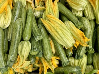 zucchini on the market. market. closeup of zucchini viewed from above - vegetable background