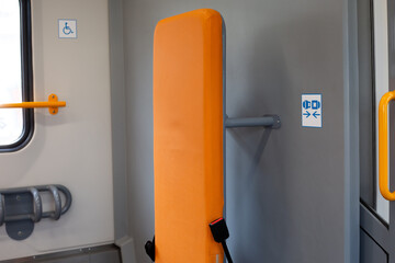 Backrest for fixing and controlling child stroller or wheelchair while traveling on train, fixation...