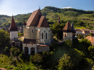 Naklejka premium Drone view of a Medieval Fortified Church of Biertan in a sunny day of summer in Romania