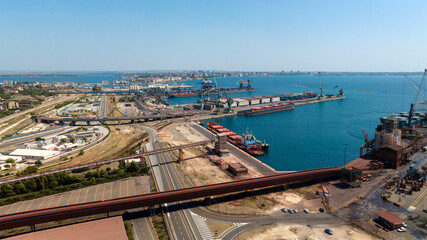 Aerial view of the industrial port of Taranto, in Puglia, Italy.